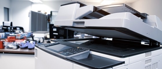 Photo the photocopier or printer is office work tool equipment for scanning document and copy paper