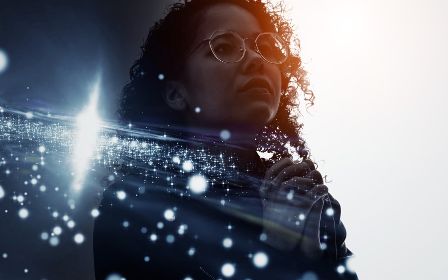 futuristic image lockup with girl with glasses against cosmic background